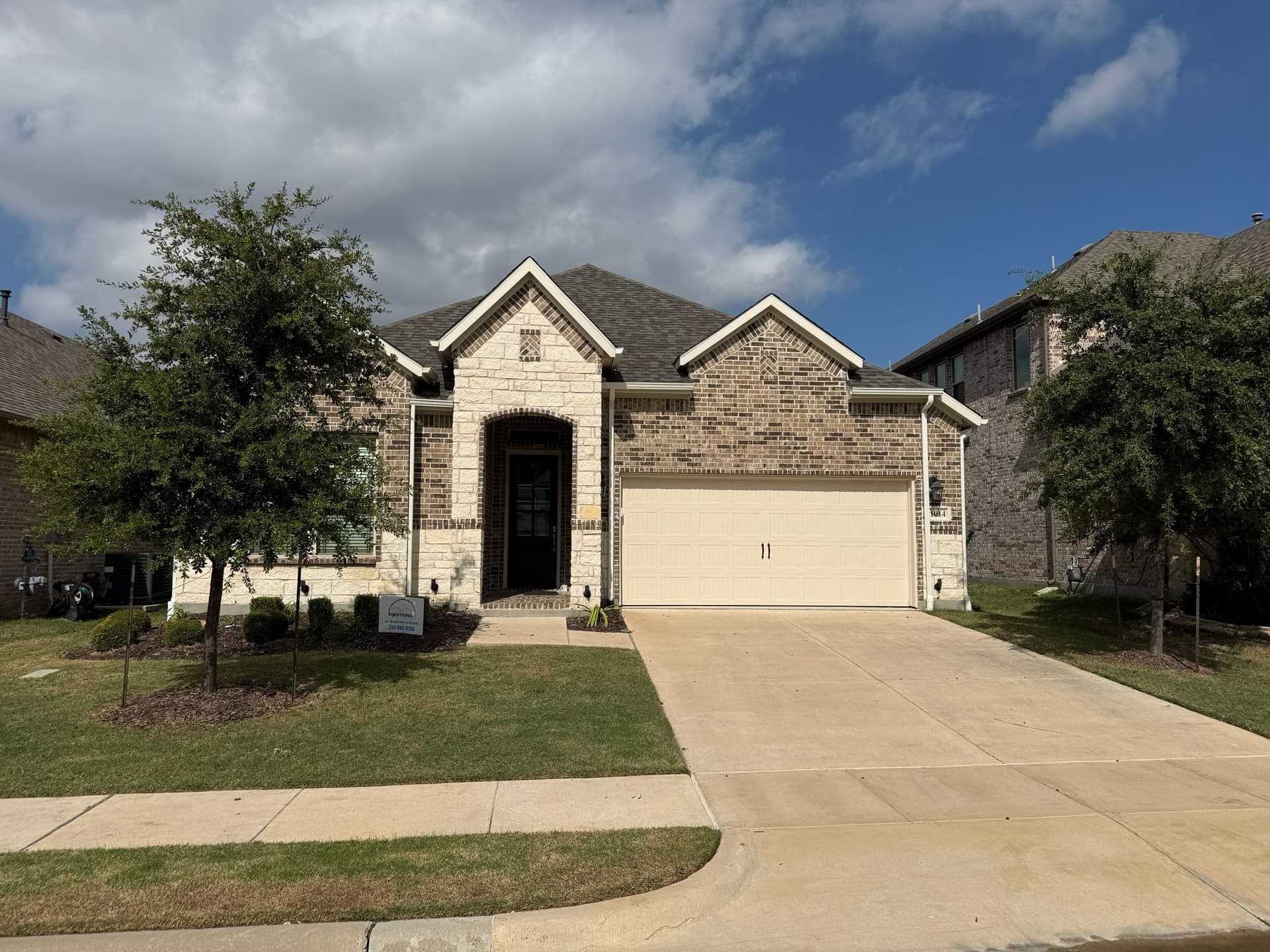 Complete Home Makeover with New Roof, Gutters, and Garage Door image