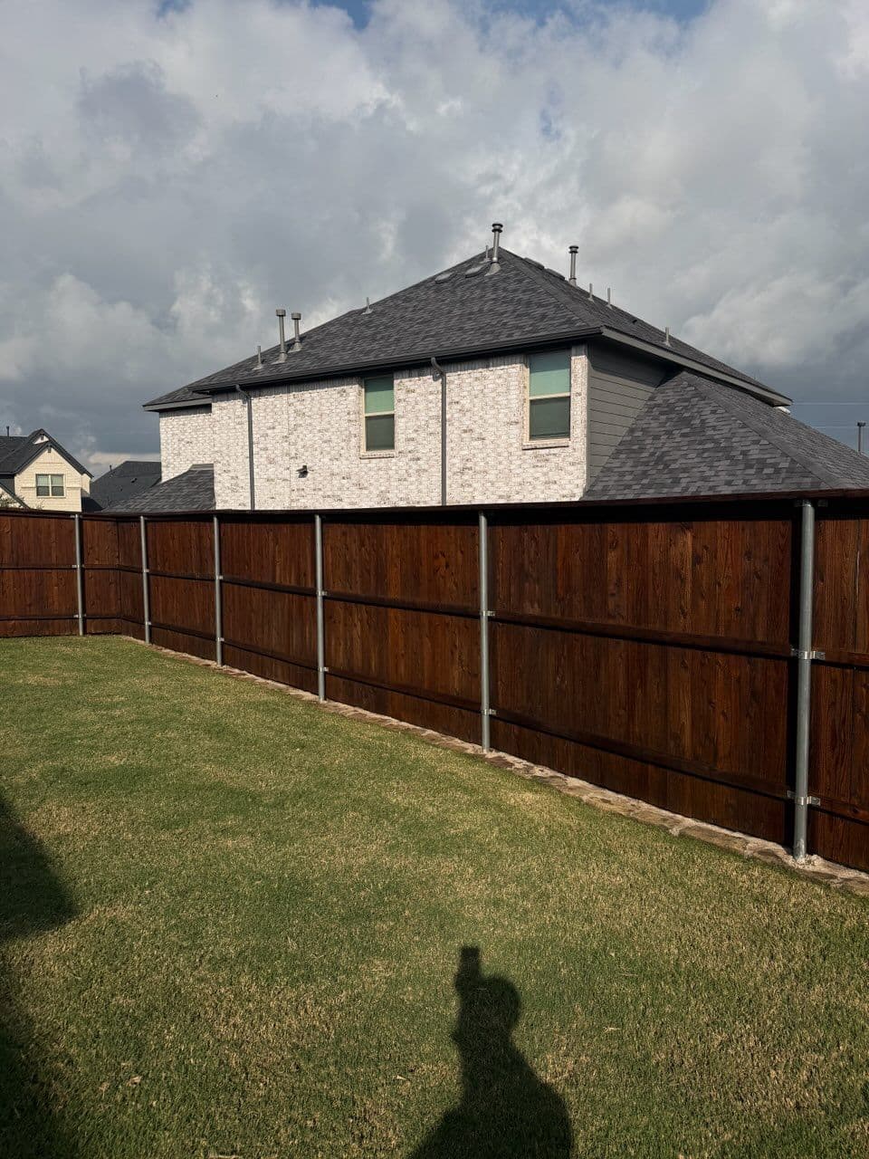 Transform Your Backyard with a Freshly Stained Fence